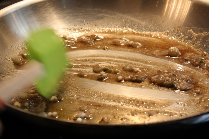 The stems will flavor the butter. Cook them over medium heat for about 4 minutes. 