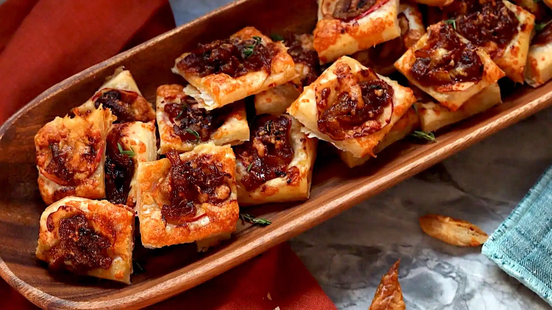 How to Make Cheesy Apple Pastry Bites With Caramelized Onions